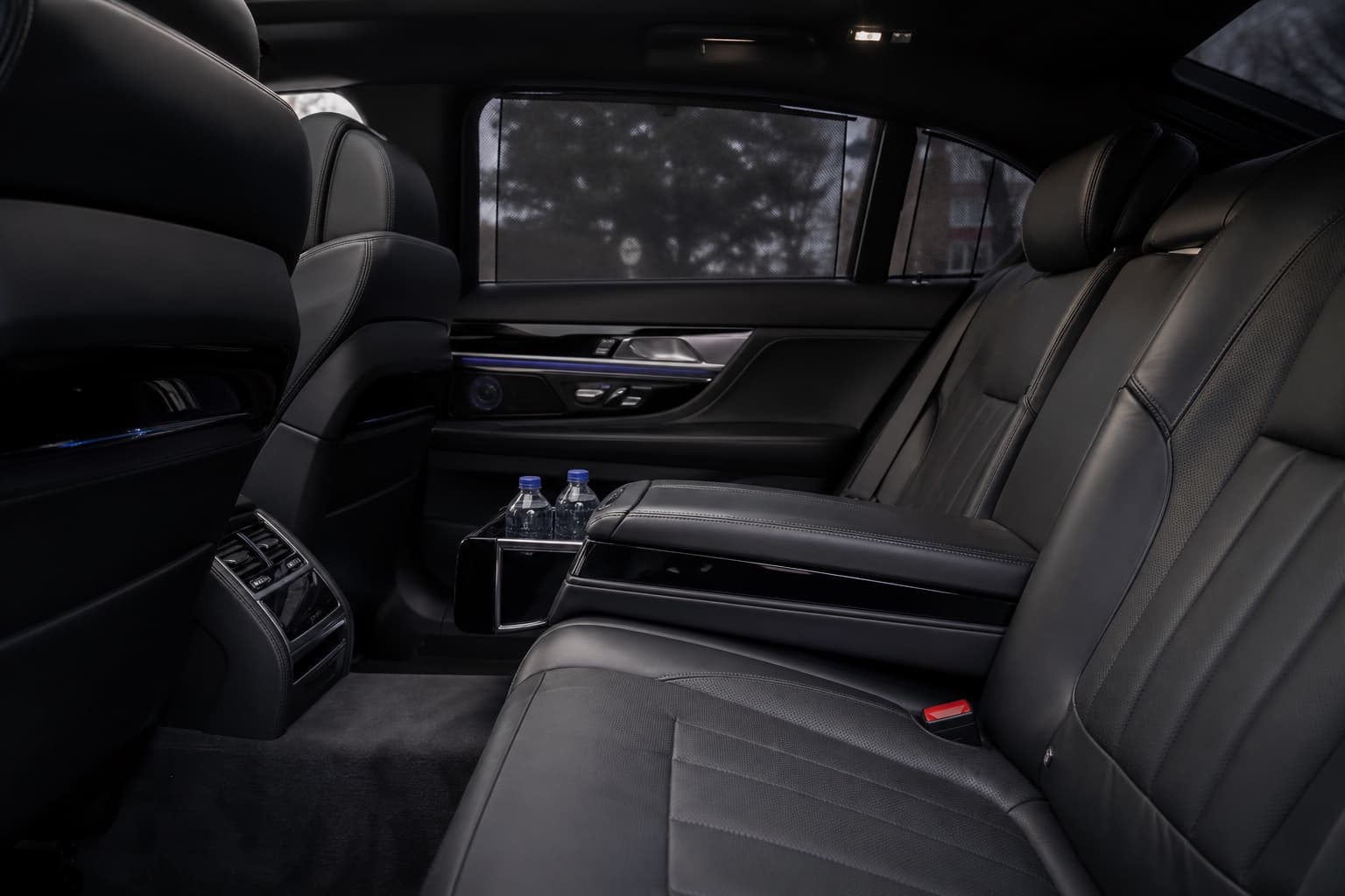 Premium leather rear cabin of a luxury black SUV